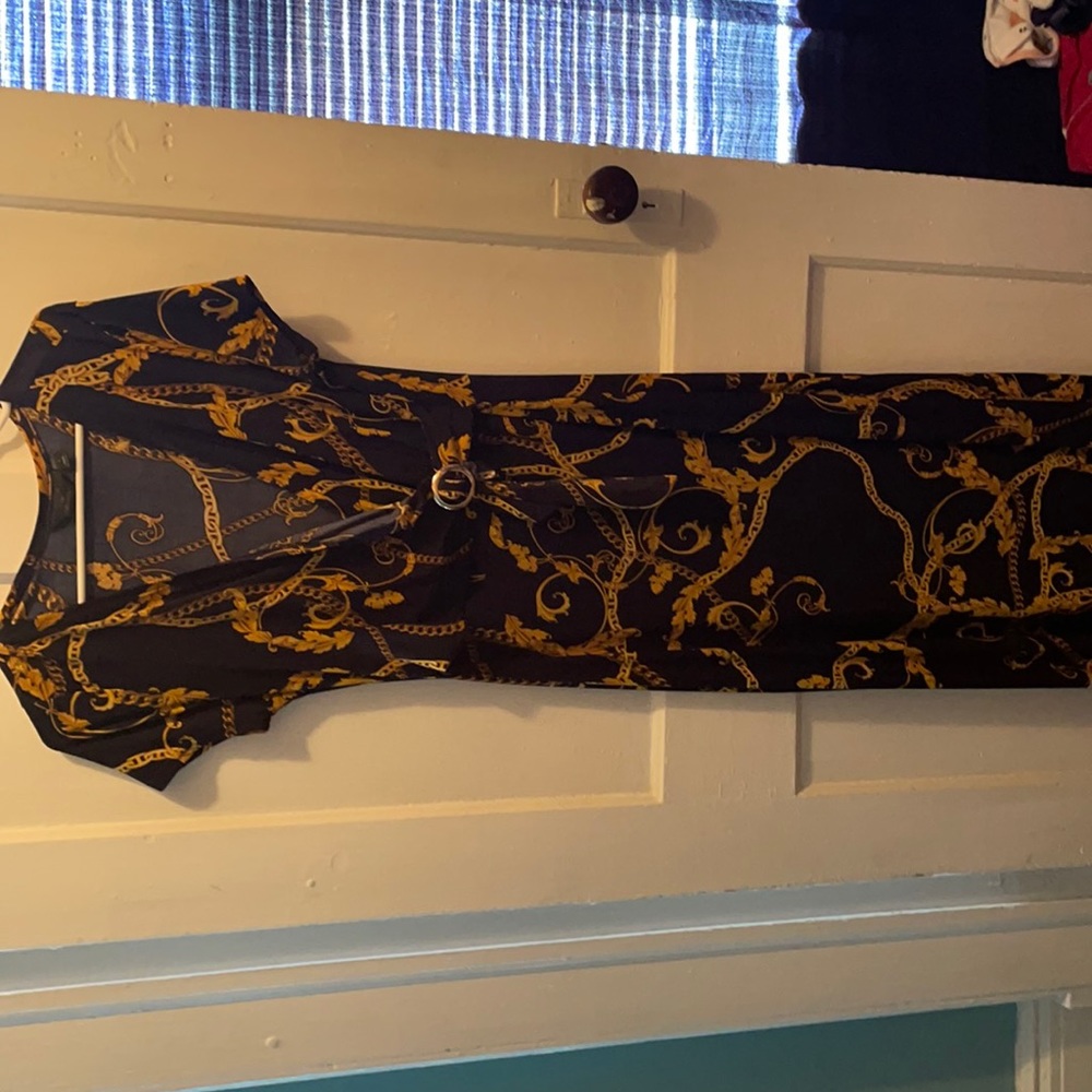 Floor length gold chain blue dress